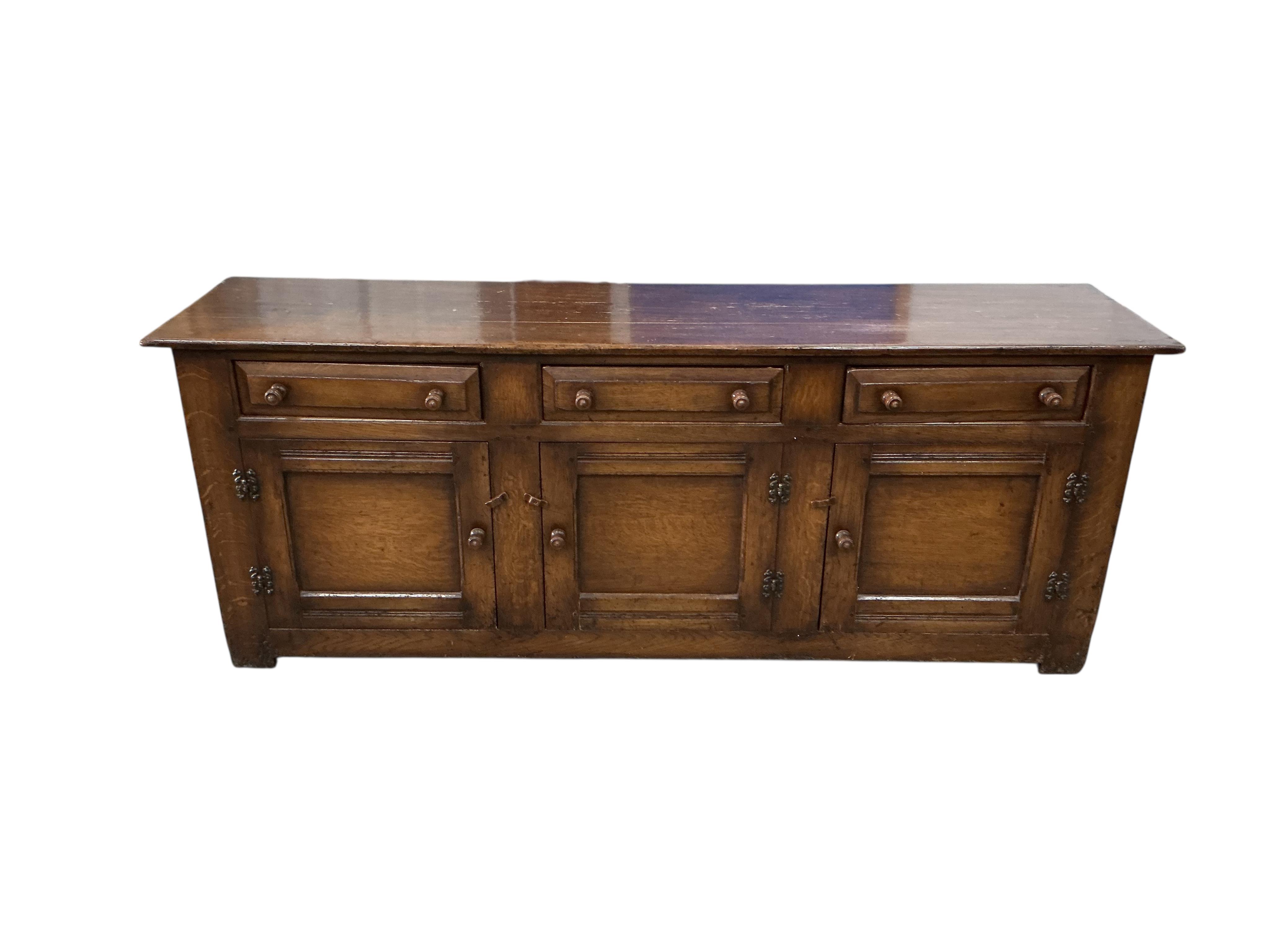 A reproduction 18th century style oak low dresser, width 198cm, depth 48cm, height 76cm